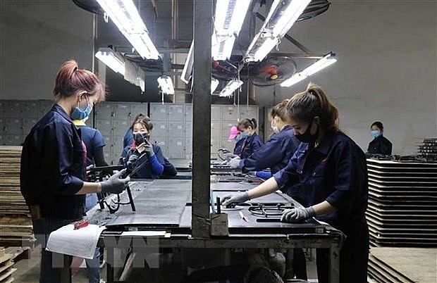 Production at Vietnam Bright International in Thuan Thanh district, Bac Ninh province. (Photo: VNA)
