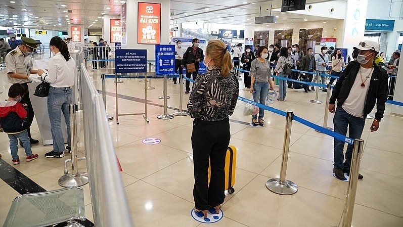Passengers at Noi Bai International Airport Passengers at Noi Bai International Airport