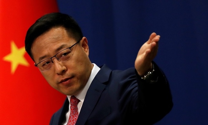 Trung Quốc mượn lời WHO, bác cáo buộc virus corona 'từ phòng thí nghiệm' trung quoc muon loi who bac cao buoc virus corona tu phong thi nghiem