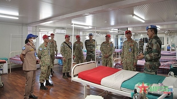 Members of Vietnam's level-2 field hospital No. 3 learn about SOP standard procedures in hospital operation. Photo: qdnd.vn Members of Vietnam's level-2 field hospital No. 3 learn about SOP standard procedures in hospital operation. Photo: qdnd.vn