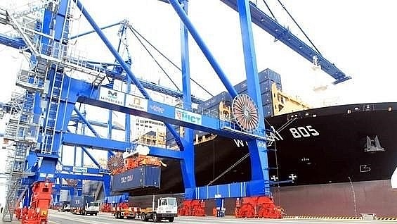 Goods are loaded and unloaded at Hai Phong Port. Photo: VNA Goods are loaded and unloaded at Hai Phong Port. Photo: VNA