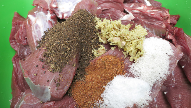 Cooking smoked buffalo: a must-try dish of the Thai ethnic group Cooking smoked buffalo: a must-try dish of the Thai ethnic group