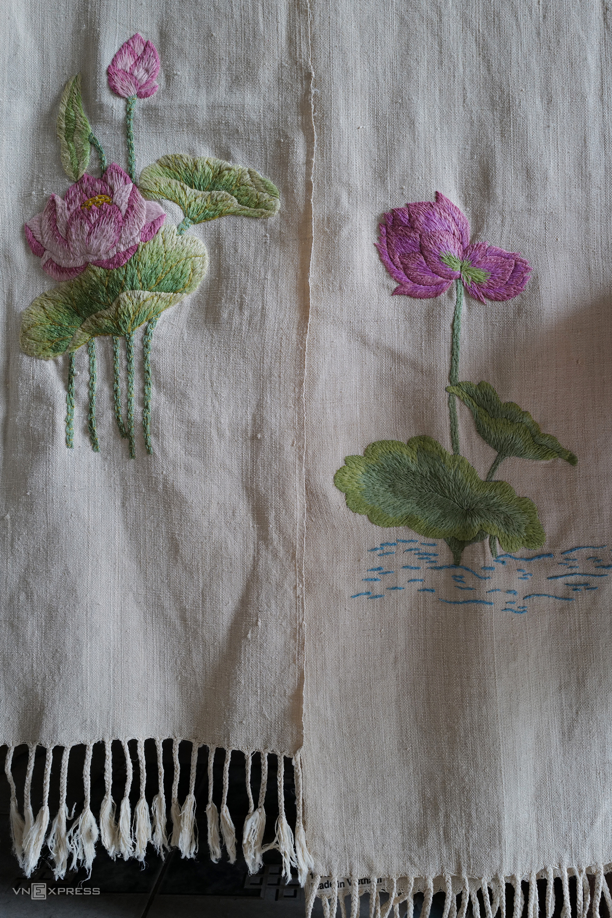 Vietnam's First Artisan to Weave Lotus Silk Vietnamese Artisan Weaves New Lotus Silk