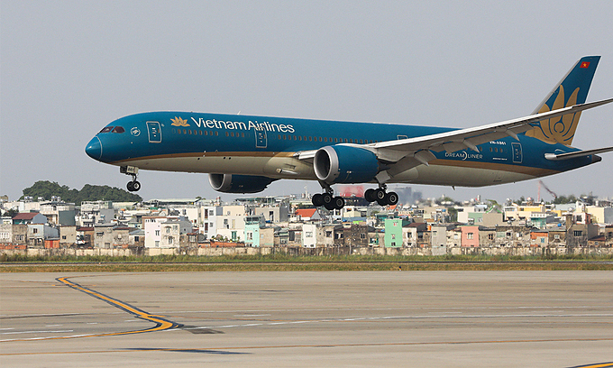 A plane of Vietnam Airlines at HCMC's Tan Son Nhat Airport. Photo: VnExpress A plane of Vietnam Airlines at HCMC's Tan Son Nhat Airport. Photo: VnExpress