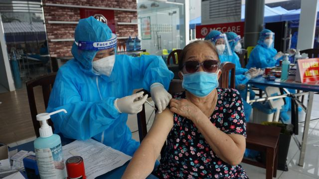 A local resident in HCM City is vaccinated against Covid-19. Photo: VNA/VNS A local resident in HCM City is vaccinated against Covid-19. Photo: VNA/VNS