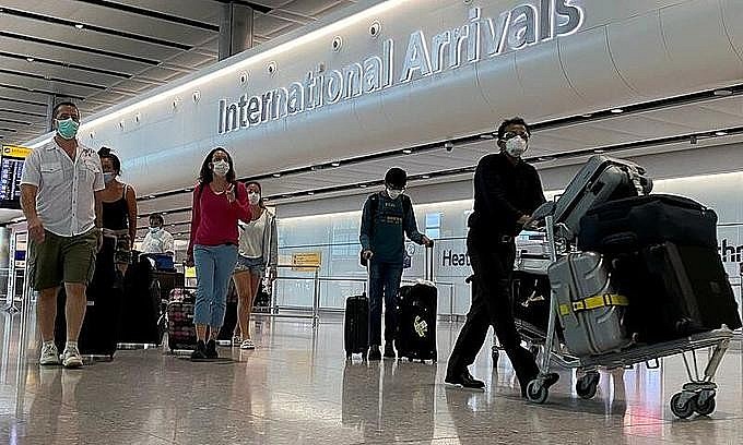 Passengers arrive at Heathrow Airport in London, England, July 29, 2020. Photo: Reuters Passengers arrive at Heathrow Airport in London, England, July 29, 2020. Photo: Reuters