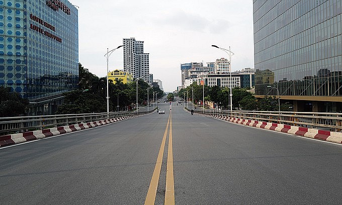 An intersection between Kim Ma Street and Nguyen Chi Thanh Street in Hanoi is almost empty on September 2, 2021. Photo: VnExpress An intersection between Kim Ma Street and Nguyen Chi Thanh Street in Hanoi is almost empty on September 2, 2021. Photo: VnExpress