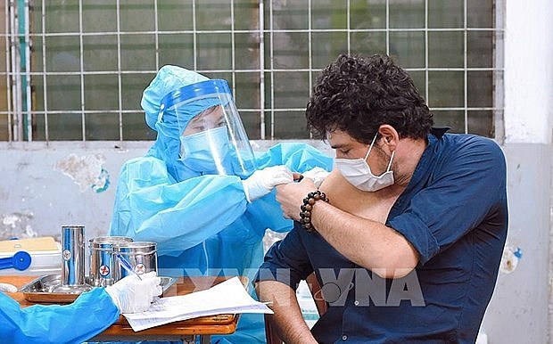 Hanoi aims to vaccinate all of foreigners living, studying and working in the city. Photo: VNA Hanoi aims to vaccinate all of foreigners living, studying and working in the city. Photo: VNA