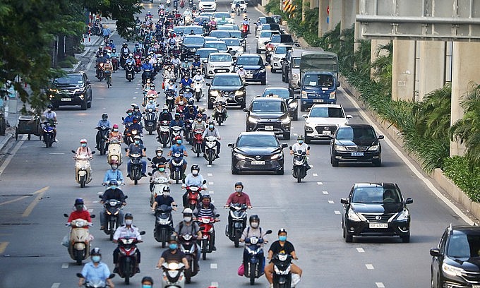 Vehicles run on a downtown Hanoi street, September 2021. Photo: VnExpress Vehicles run on a downtown Hanoi street, September 2021. Photo: VnExpress