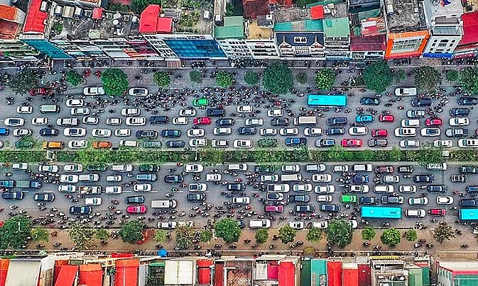 Vehicles run on Hanoi's Xa Dan Street. Photo: VnExpress Vehicles run on Hanoi's Xa Dan Street. Photo: VnExpress