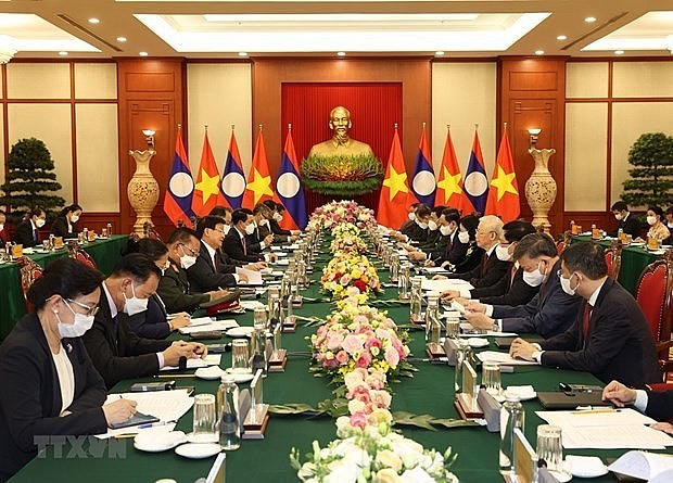 The talks between Vietnamese Party General Secretary Nguyen Phu Trong and Party General Secretary and President of Laos Thongloun Sisoulith in Hanoi in June 2021. Photo: VNA The talks between Vietnamese Party General Secretary Nguyen Phu Trong and Party General Secretary and President of Laos Thongloun Sisoulith in Hanoi in June 2021. Photo: VNA