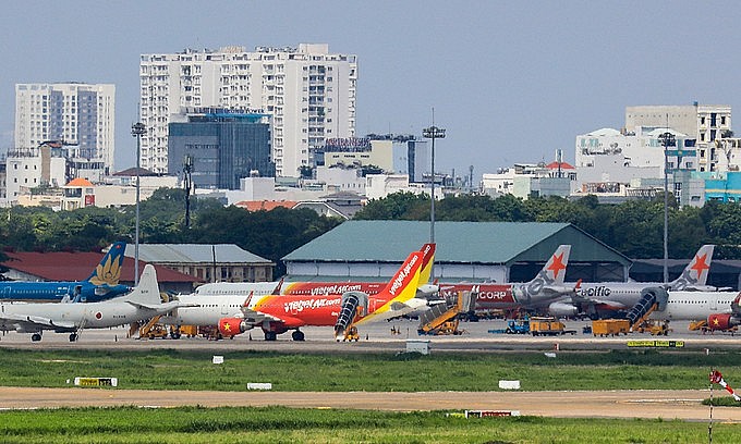 Aircraft park at Tan Son Nhat International Airport in Ho Chi Minh City, June, 2020. Photo: VnExpress Aircraft park at Tan Son Nhat International Airport in Ho Chi Minh City, June, 2020. Photo: VnExpress