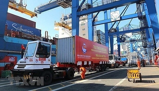 This year, total import-export revenue is estimated at about 660.1 billion USD, up 21 percent year on year, including 331.1 billion USD of exports. Photo: VNA This year, total import-export revenue is estimated at about 660.1 billion USD, up 21 percent year on year, including 331.1 billion USD of exports. Photo: VNA