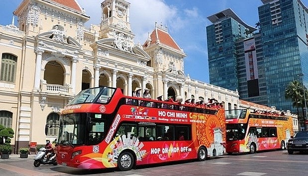 Hop on-hop off bus in HCM City. Photo: VNA Hop on-hop off bus in HCM City. Photo: VNA