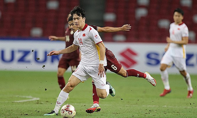 Nguyen Hoang Duc dribbles in the second leg of the AFF Cup semifinal between Vietnam and Thailand on December 26, 2021. Photo: Leo Shengwei Nguyen Hoang Duc dribbles in the second leg of the AFF Cup semifinal between Vietnam and Thailand on December 26, 2021. Photo: Leo Shengwei