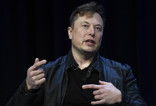 Elon Musk speaks at a conference in March. (AP Photo/Susan Walsh, File) 1232 elon musk