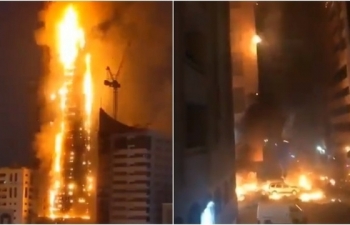 massive fire lights up residential skyscraper in uae
