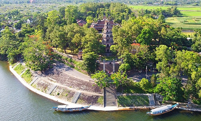 Boats dock in front of Thien Mu Pagoda by the iconic Huong (Perfume) River in Hue, 2020. Photo: VnExpress Boats dock in front of Thien Mu Pagoda by the iconic Huong (Perfume) River in Hue, 2020. Photo: VnExpress