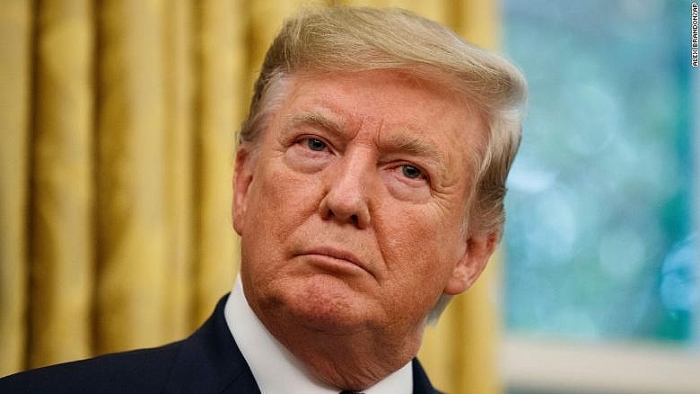 ong trump doa ban bo tinh trang khan cap buoc cong ty my roi trung quoc