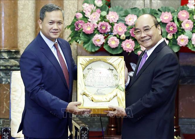 Chủ tịch nước tiếp Phó Tổng tư lệnh kiêm Tư lệnh Lục quân Quân đội Hoàng gia Campuchia Chú thích ảnh