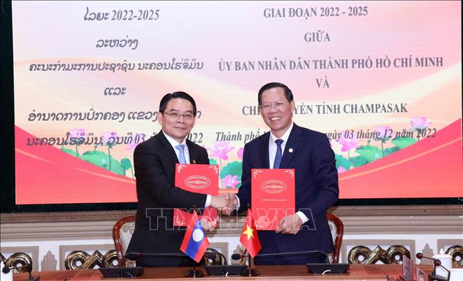 Thành phố Hồ Chí Minh và tỉnh Champasak, Lào ký thỏa thuận hợp tác hữu nghị Chú thích ảnh