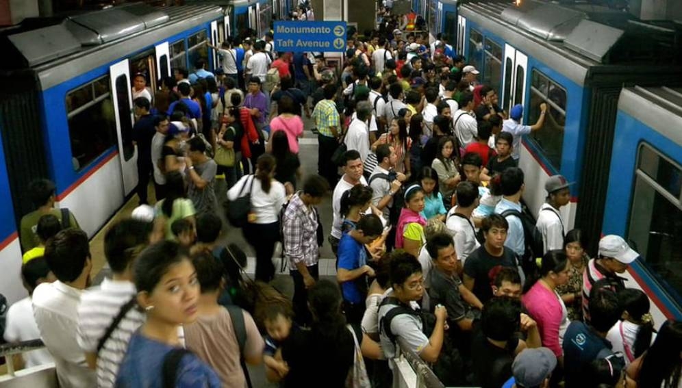 Crowded train station in the Philippines. Social distancing will need to be factored in public transport systems because of COVID-19. Copyright: Image from PXFuel. 4306 asiays public transport systems limit social distancing