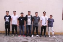 seven chinese involved in online gambling handed over to china