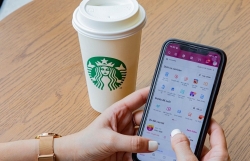 MoMo становится первым электронным кошельком, интегрированным для оплаты в Starbucks